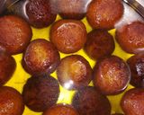 A picture of step 13 of Potato gulab jamun.