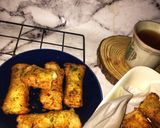 A picture of step 4 of Egg and cheesy bread rolls.