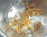 A picture of step 1 of Turmeric rice served with chicken.