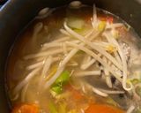 A picture of step 2 of Salmon Head Soup with Asparagus.