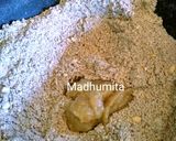 A picture of step 4 of Millet ladoo nachni with chocolate.