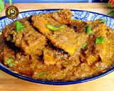 A picture of step 1 of Raw Banana Curry (Kachche Kele ki sabzi).