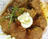 A picture of step 8 of Mustard 'Rui' Fish Curry.