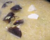 A picture of step 3 of Risotto cozze e zafferano mussel and saffron risotto.