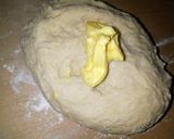 A picture of step 5 of Pumpkin shaped dinner rolls.