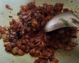 A picture of step 2 of Sweet and sour tomato bhaji.