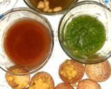 A picture of step 7 of Indian snack (crisp sphere with flavoured water/curd mixture).