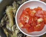 A picture of step 11 of Kuku Kienyeji (organic chicken) stew.