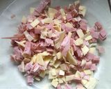 Foto del paso 5 de la receta: PANCITOS RELLENOS DE JAMÓN Y QUESO EN LA SARTÉN 🥖🧀🥓🍳