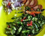 Foto langkah ke 1 dari resep Tumis pedas pare ular.