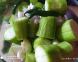 A picture of step 1 of Ridge gourd bharta.
