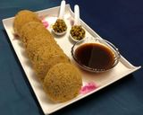 A picture of step 11 of Oats Idli Stuffed with Sprouts Moong.
