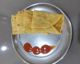 A picture of step 6 of Besan Chilla with Potato Masala Filling.