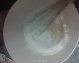 Foto del paso 2 de la receta: Queque en Olla con Milo y rosquilla de coco por encima 🤭