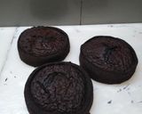 A picture of step 2 of 8 inch tall chocolate brownie cake.