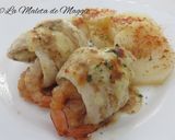 Foto del paso 12 de la receta Rollitos de merluza con gambas en salsa de limón