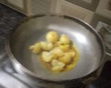 A picture of step 5 of Amla pickle.