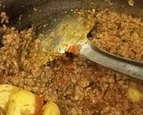 A picture of step 8 of Qeema aloo.
