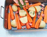 A picture of step 8 of Roast Chicken with Potatoes & Carrots.