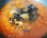 Foto del paso 3 de la receta: Arroz negro picante con calamares