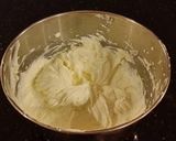 A picture of step 8 of White Chocolate Cherry Truffle Cheesecake.