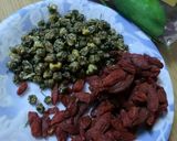 A picture of step 2 of Healthy Tea Drink ~ Chrysanthemum, Goji Berry, and Winter Melon Tea.