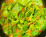 A picture of step 7 of Cod rolls with tomatoes and spinach.