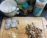 A picture of step 1 of Scrambled egg with shrimp on rice.