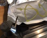 Une image de l'étape 1 de Pavé de saumon au thym frais,tomates et citron vert (riz Halloween).