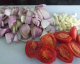 A picture of step 2 of Bhindi Chicken with three Spices.