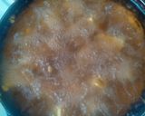 A picture of step 8 of Viazi Karai with Dhania and seasonings.