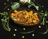 A picture of step 8 of Aloo Gobi Matar.