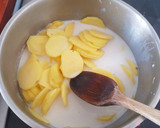 Une image de l'étape 3 de Gratin Dauphinois.