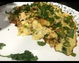A picture of step 5 of Veg Omelette stuffed with veg mayonnaise.