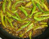 A picture of step 4 of Masala green chillies.