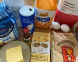 A picture of step 1 of White chocolate & nuts BLONDIES 👌😋.