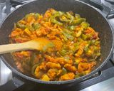 A picture of step 16 of Chicken and Bacon with Peppers, Tomatoes, Spices, and Coconut Milk.