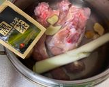 A picture of step 1 of Korean Chicken Soup.