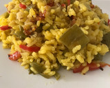 Foto del paso 13 de la receta: Arroz seco de verduras (calabacín, berenjena 🍆 pimientos 🫑...y pollo al ajillo