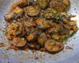 A picture of step 4 of Masaledar brinjal bhaji.