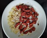 Une image de l'étape 5 de Riz au chorizo.