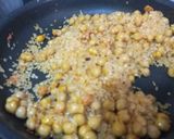 Foto del paso 4 de la receta Arroz al horno valenciano con pasas