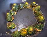 A picture of step 10 of Bharwa karela.
