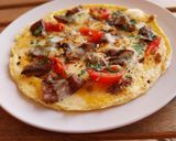 Foto del paso 9 de la receta: Tortilla abierta de rovellons, emmental y tomate