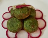 A picture of step 7 of Green Appam with Radish leaves & Green Gram.