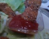 Foto del passaggio 4 della ricetta Pepite di pollo alla paprica, con panatura ai semi