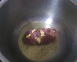 A picture of step 2 of Roast veal stuffed with cheese, herbs in sauces.