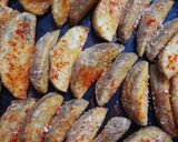 A picture of step 9 of Mexican potato wedges.