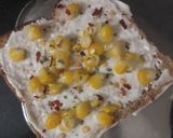 A picture of step 2 of Cheese corn open toast.