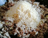 Foto del paso 6 de la receta: Calabacín relleno con pollo y champiñones